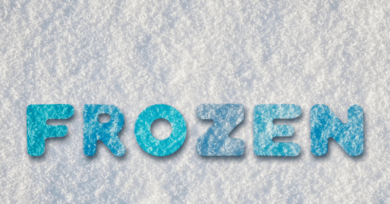 frozen spelled out on a snowy backdrop