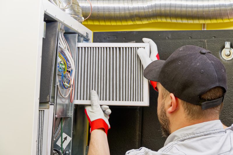 Furnace Filter Being Replaced