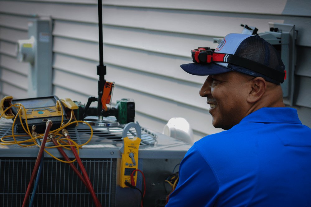G & R Tech Working on AC Unit